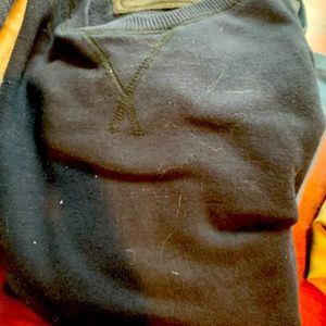 Long sleeved sweater.